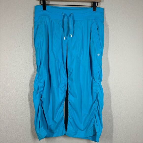 Lululemon Women's Studio Dance Mid Rise Crop Pants Teal Blue LW6601S Size 8 - Picture 1 of 6